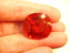 Mandarin Garnet 100cts on finger